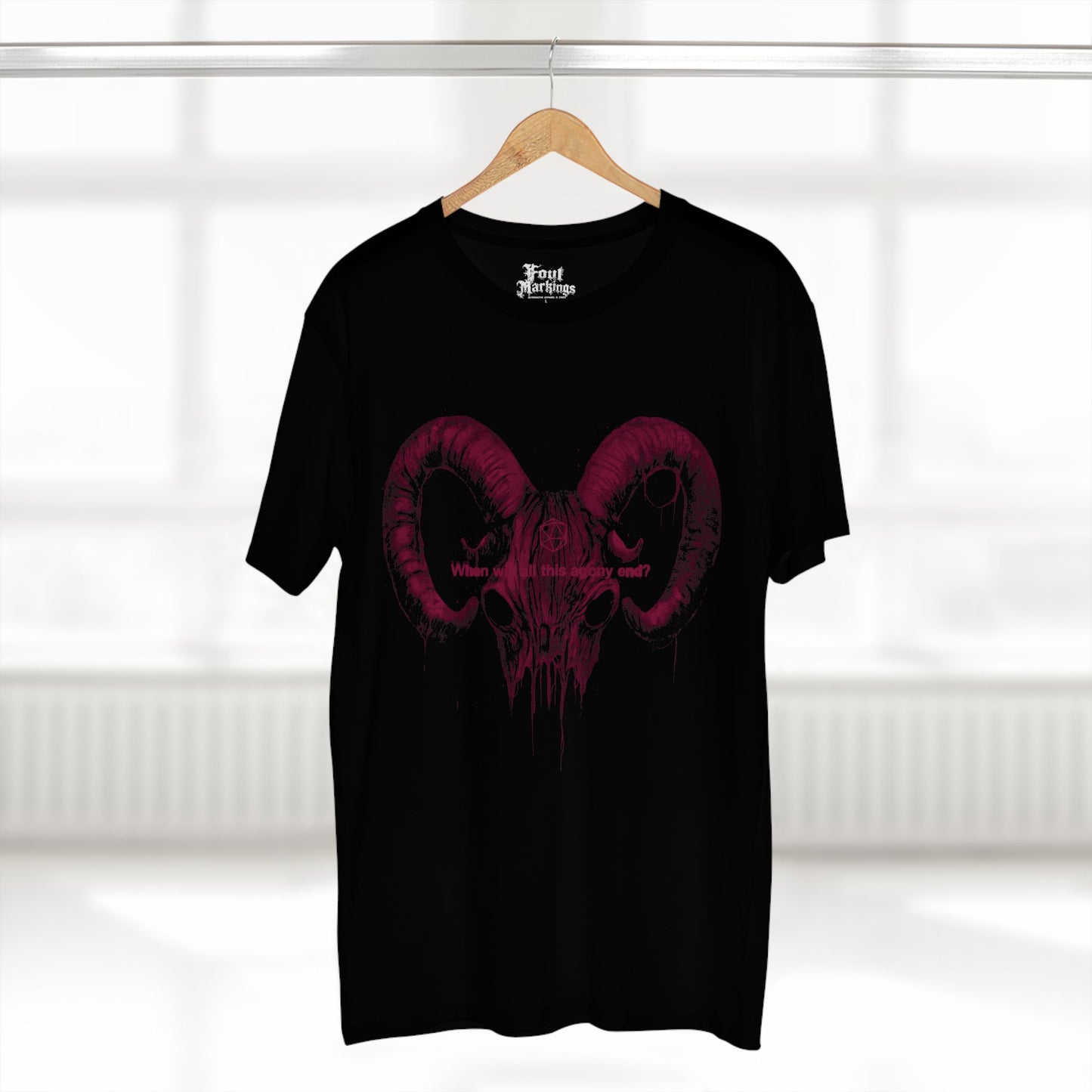 Black gnoll skull tee shown hanging
