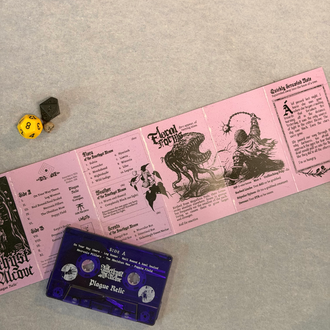 Reverse of the fold-out J-card with creature entries and the cassette