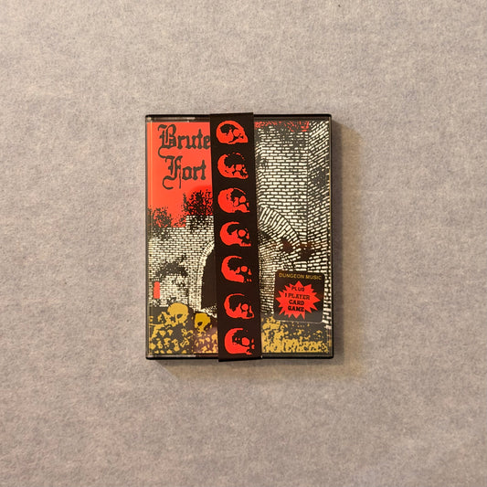 Brute Fort cassette case with red skull band on grey felt