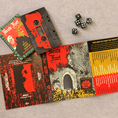 Brute Fort fold-out cassette insert with room key, card box and red cassette