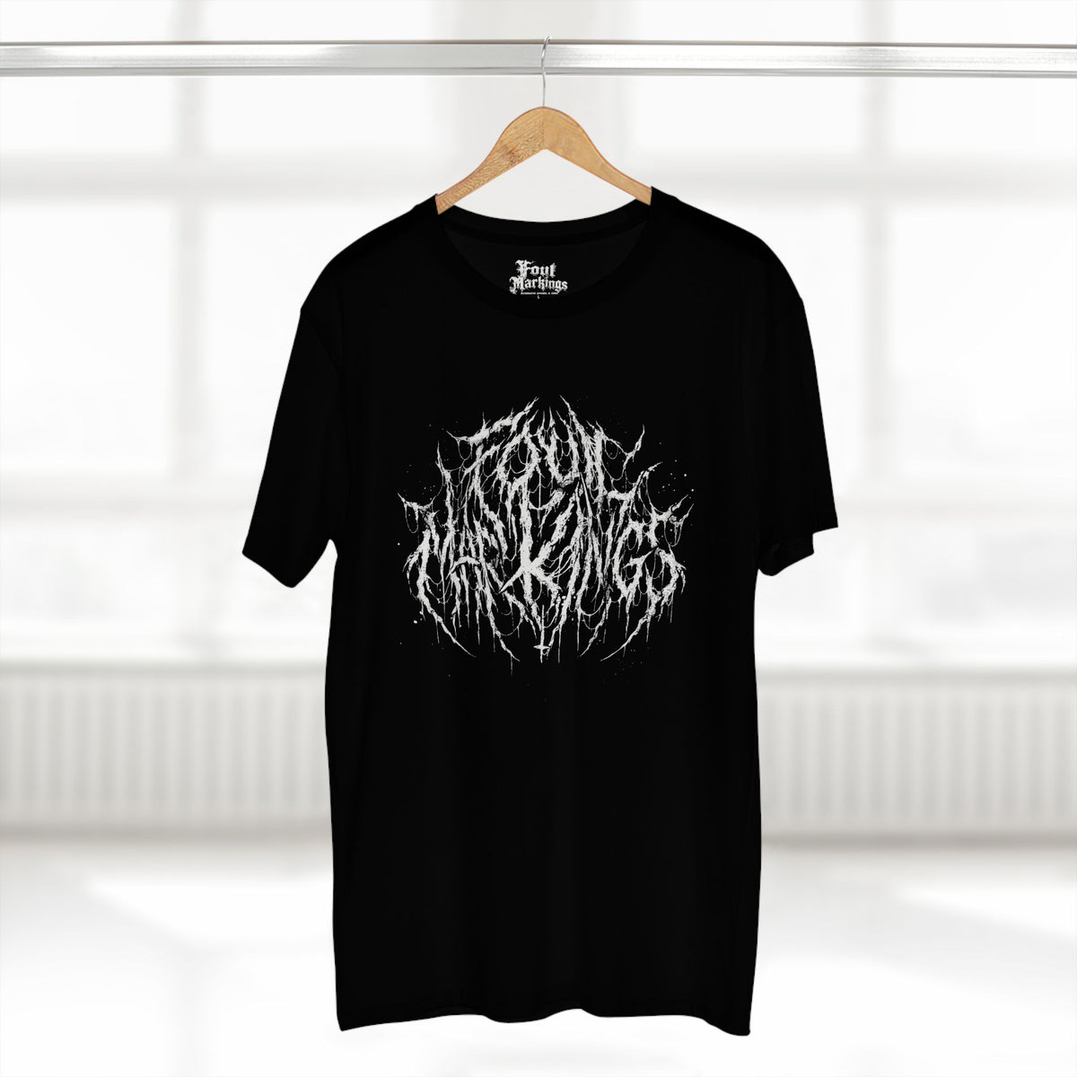 Black Foul Markings logo tee shown hanging