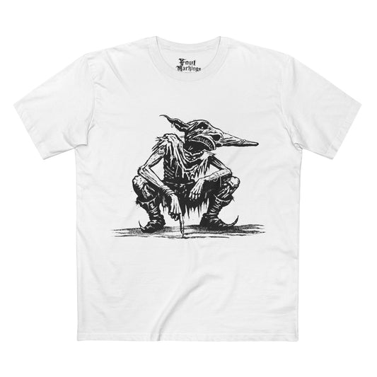 White tee with a black ink crouching goblin in tattered rags, front view