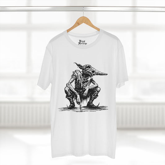 White tee with a black ink crouching goblin in tattered rags, shown hanging