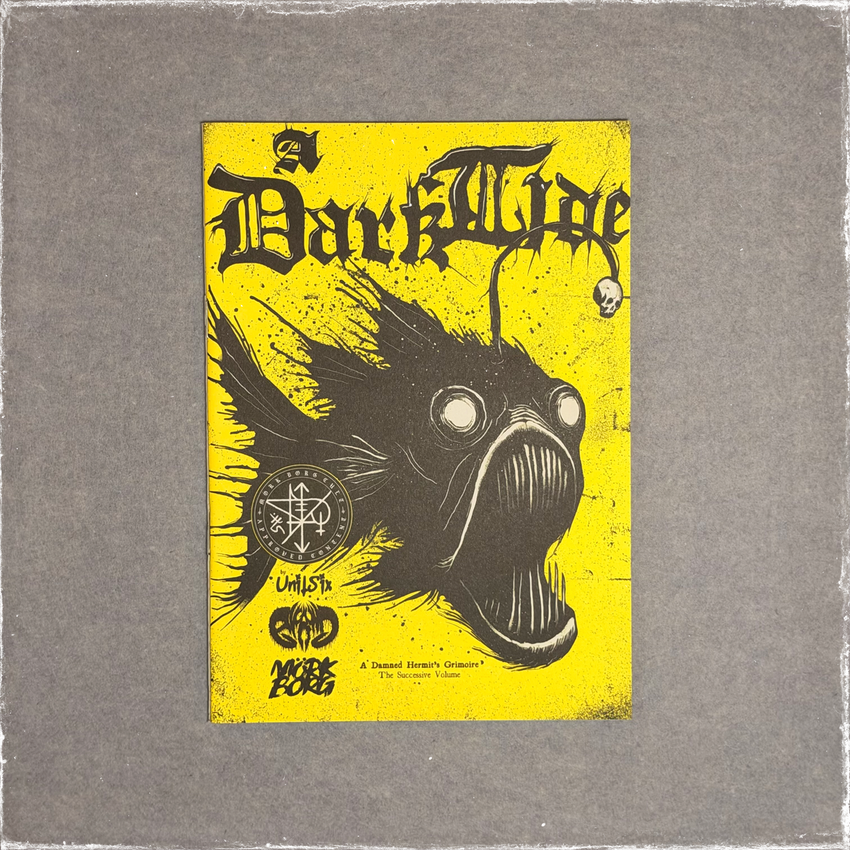 Zine cover in yellow and black, a deep sea anglerfish head under blackletter title lettering