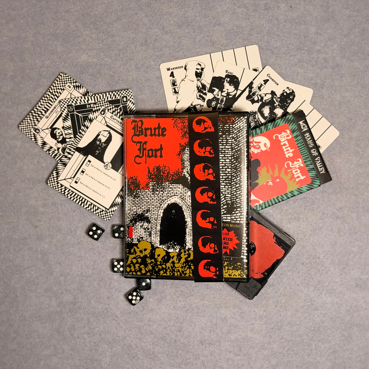 Brute Fort case with hero and room cards, card box, tape and dice laid out
