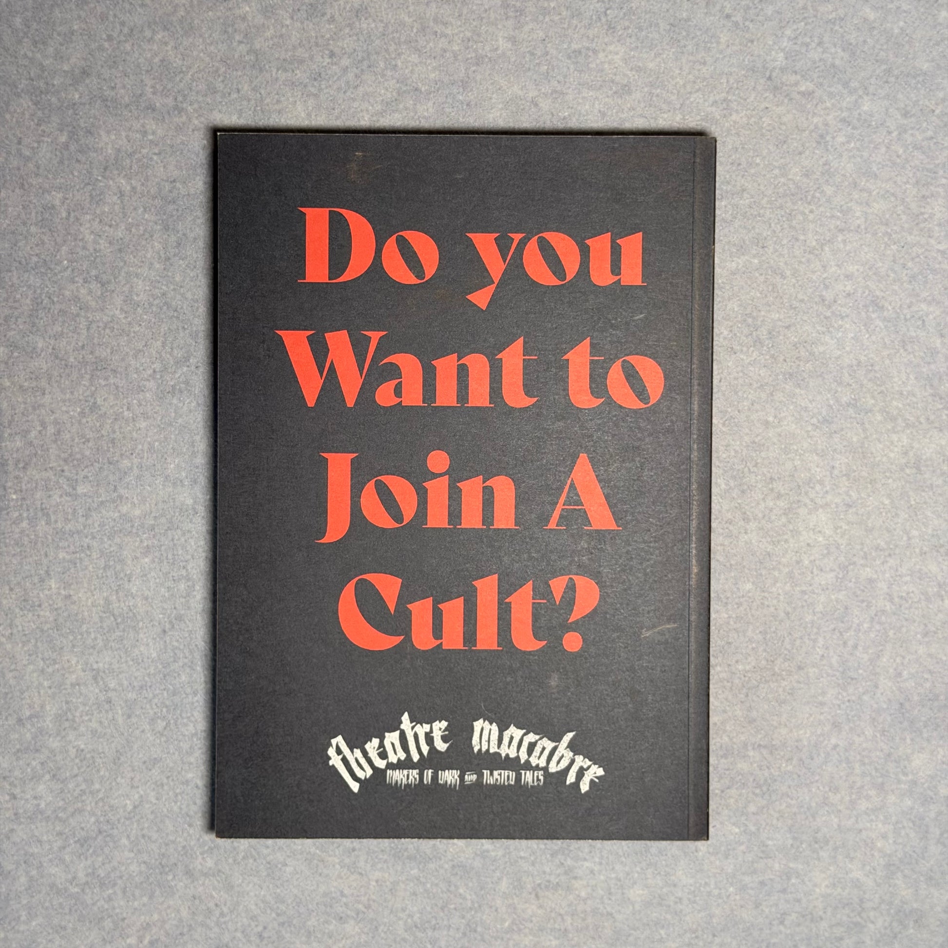 Back cover in black with the line Do you want to join a cult in red