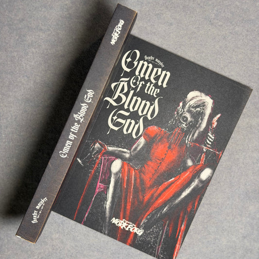 Softcover at an angle showing the spine and the cover figure in red