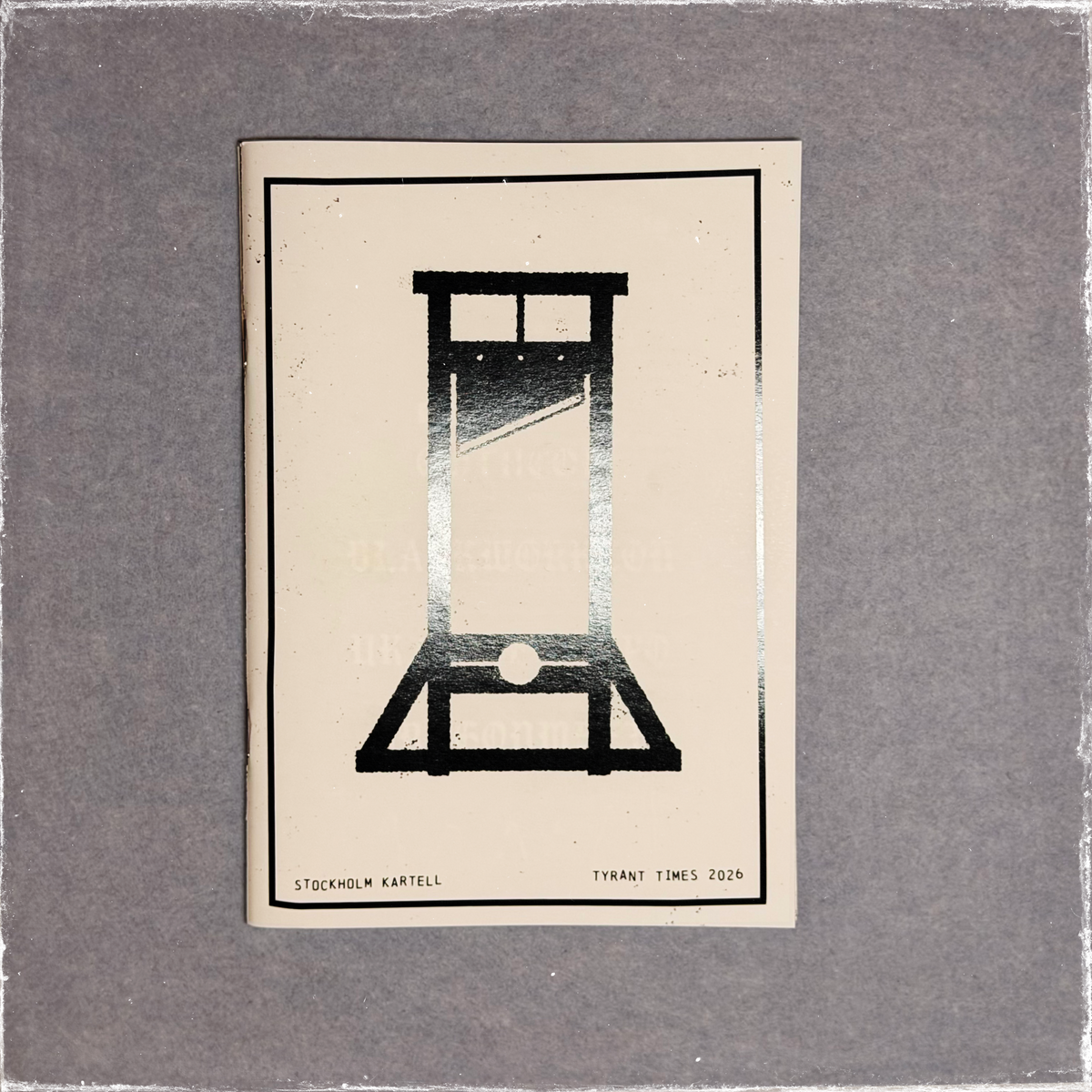 Zine cover in black and white, a guillotine standing against a pale sky
