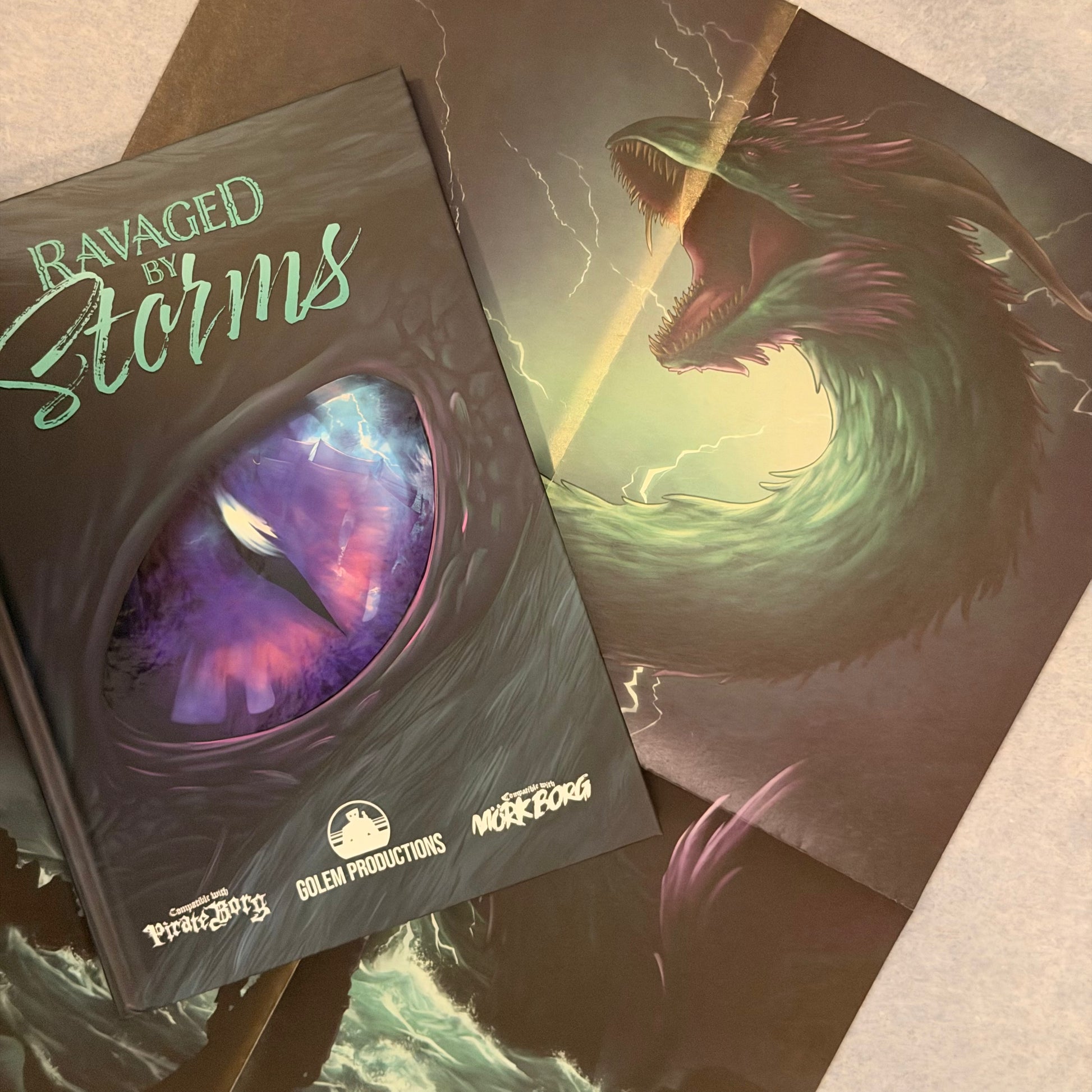 Hardback cover resting on an open page showing a coiled serpent striking