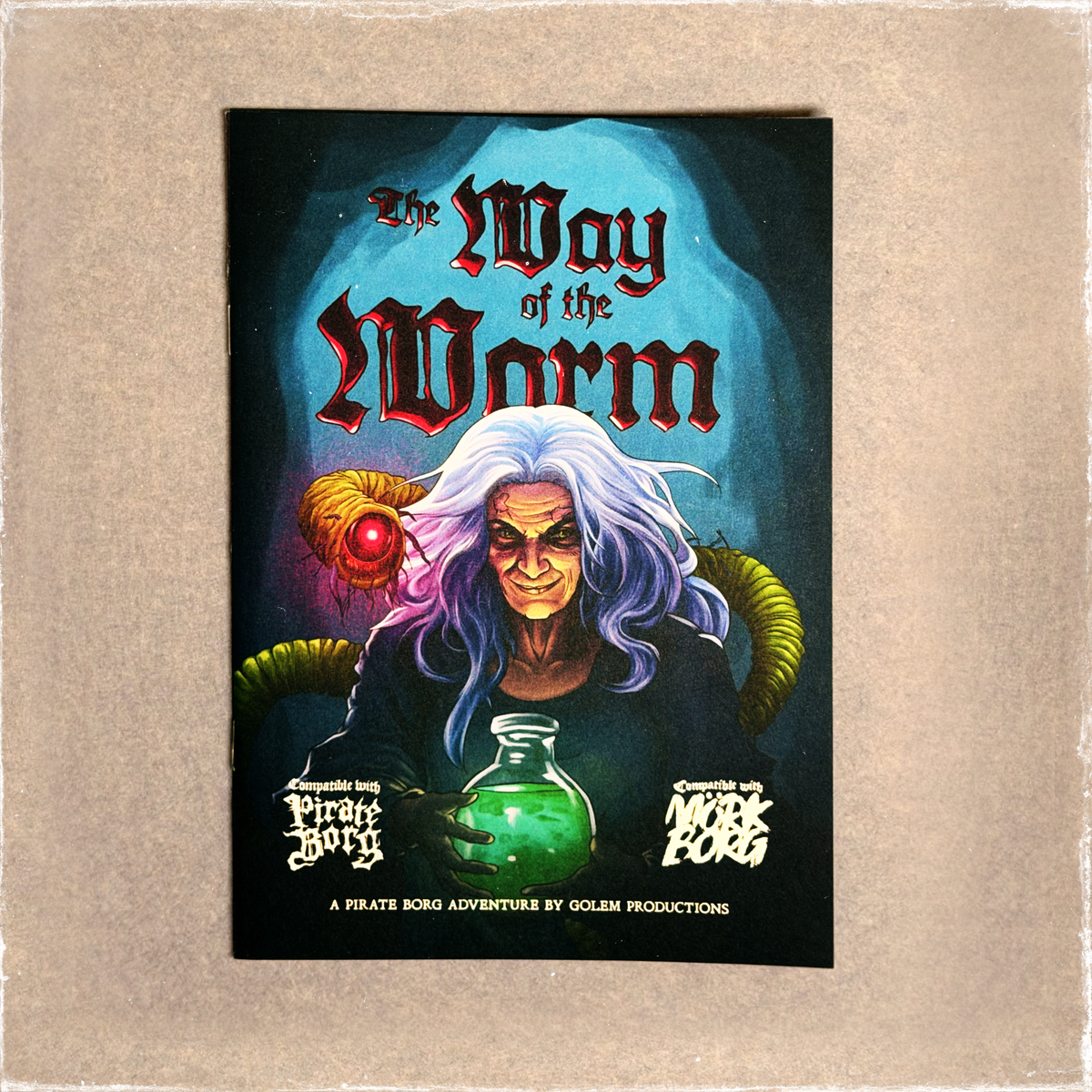 The Way of the Worm front cover, a white-haired witch holding a green flask
